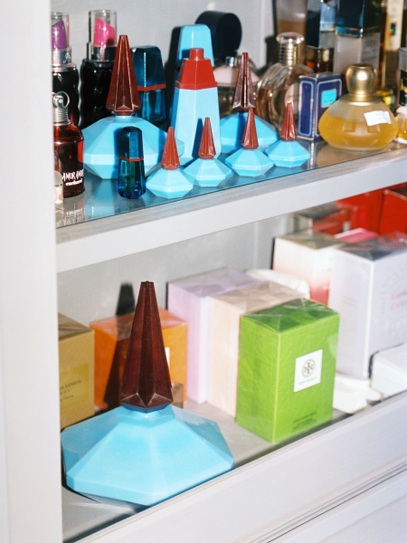 Image may contain Cosmetics Shelf Lipstick Bottle and Perfume